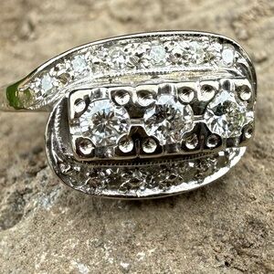 Elegant Diamond Ring Set in 14 Karat Gold with one-of-a-kind Design